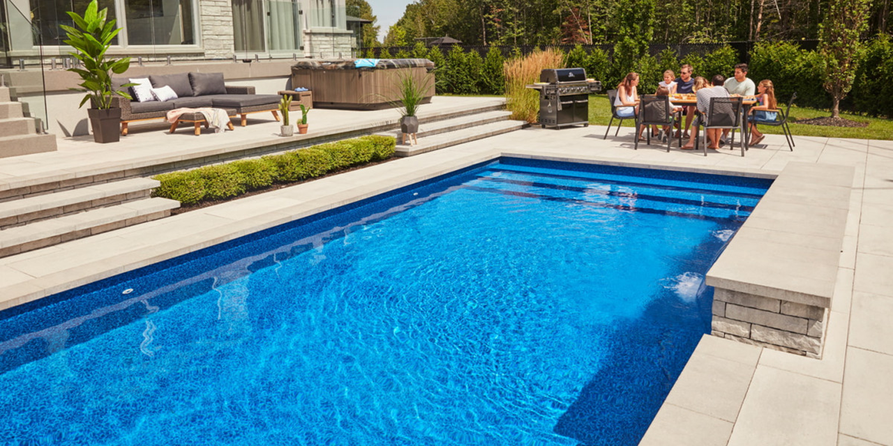 Beautifully designed inground pool with modern landscaping